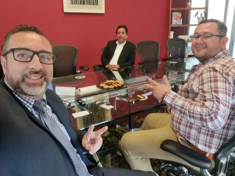 ADN Services business meeting with client in conference room
